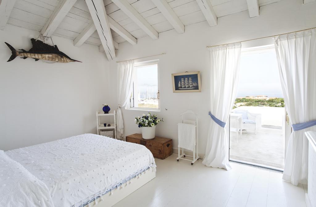 Villa Dei Tramonti Порто Ротондо Стая снимка